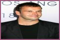 Jonny Lee Miller flashes ink for Ellen charity